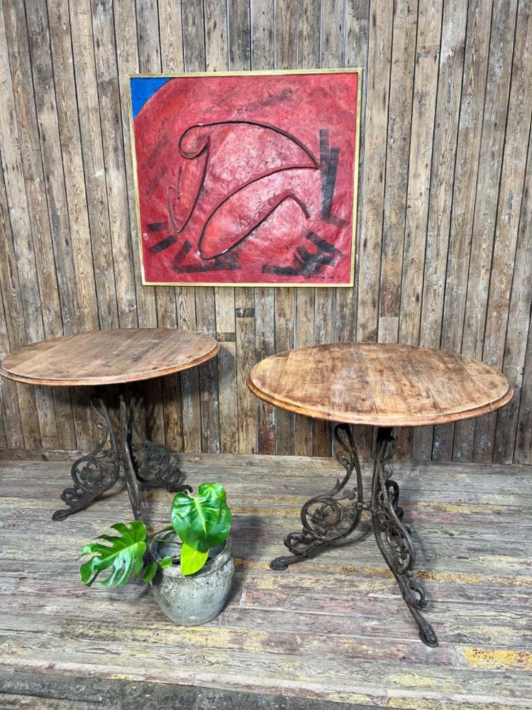 Cast iron pedestal tables, early 20th century