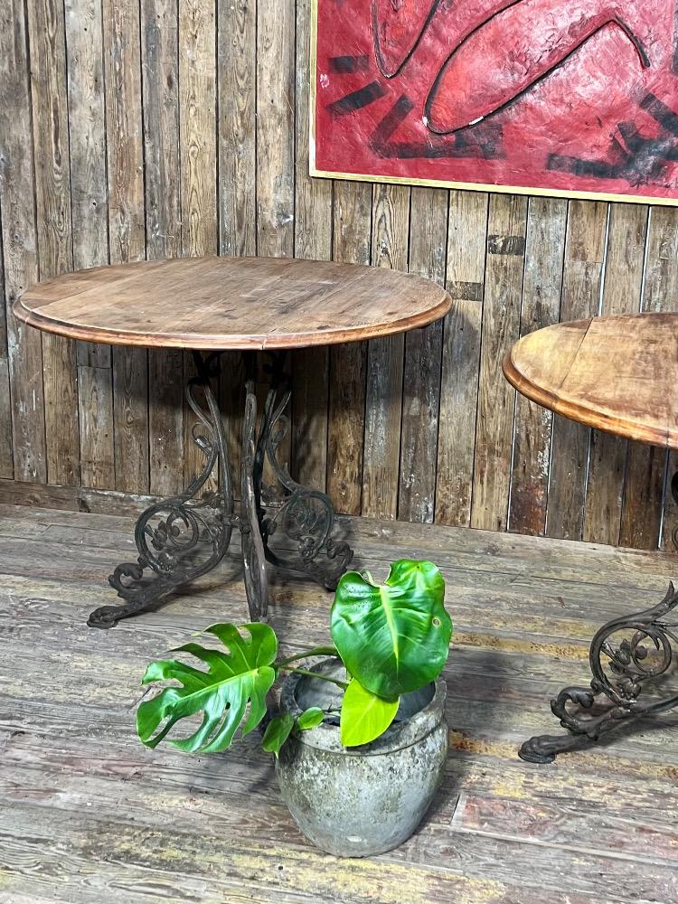Cast iron pedestal tables, early 20th century