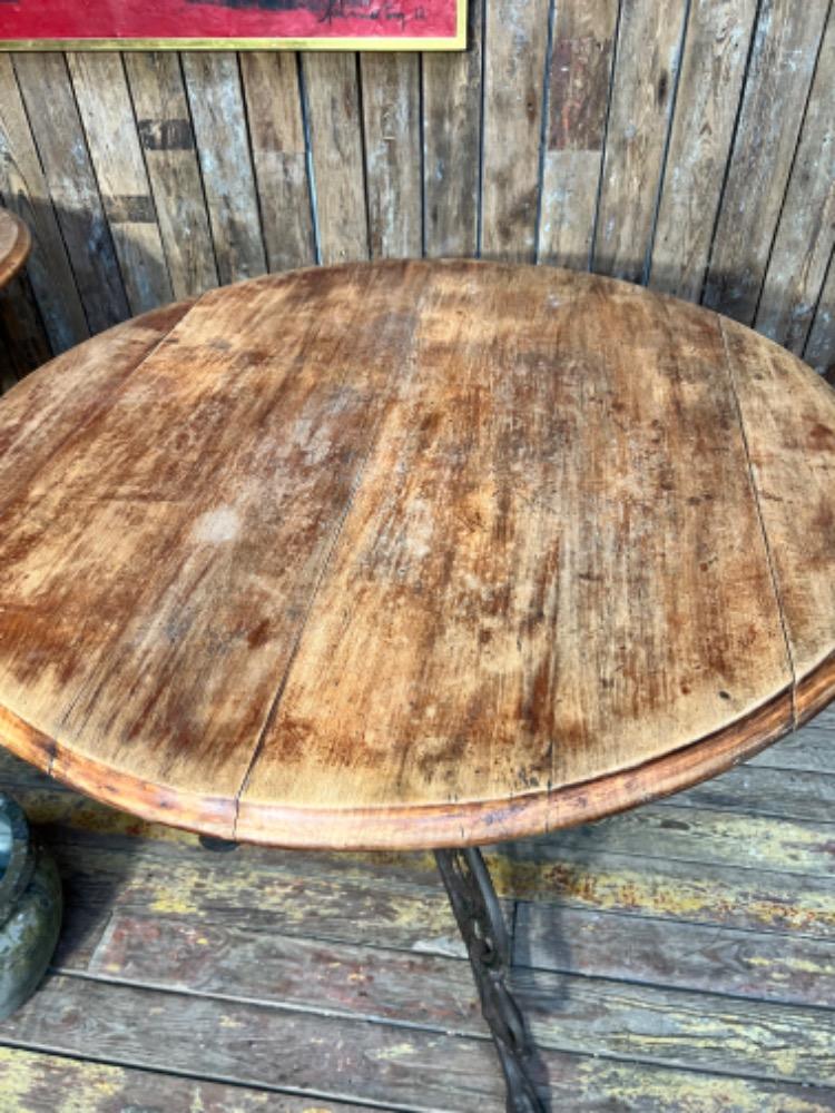 Cast iron pedestal tables, early 20th century