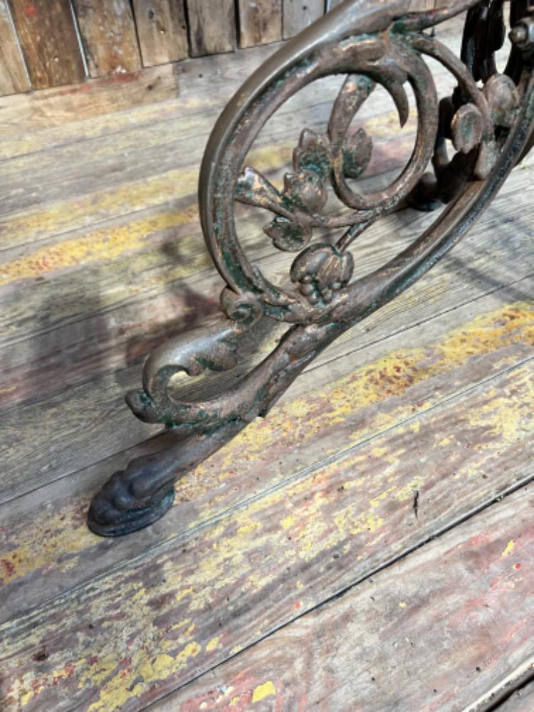 Cast iron pedestal tables, early 20th century