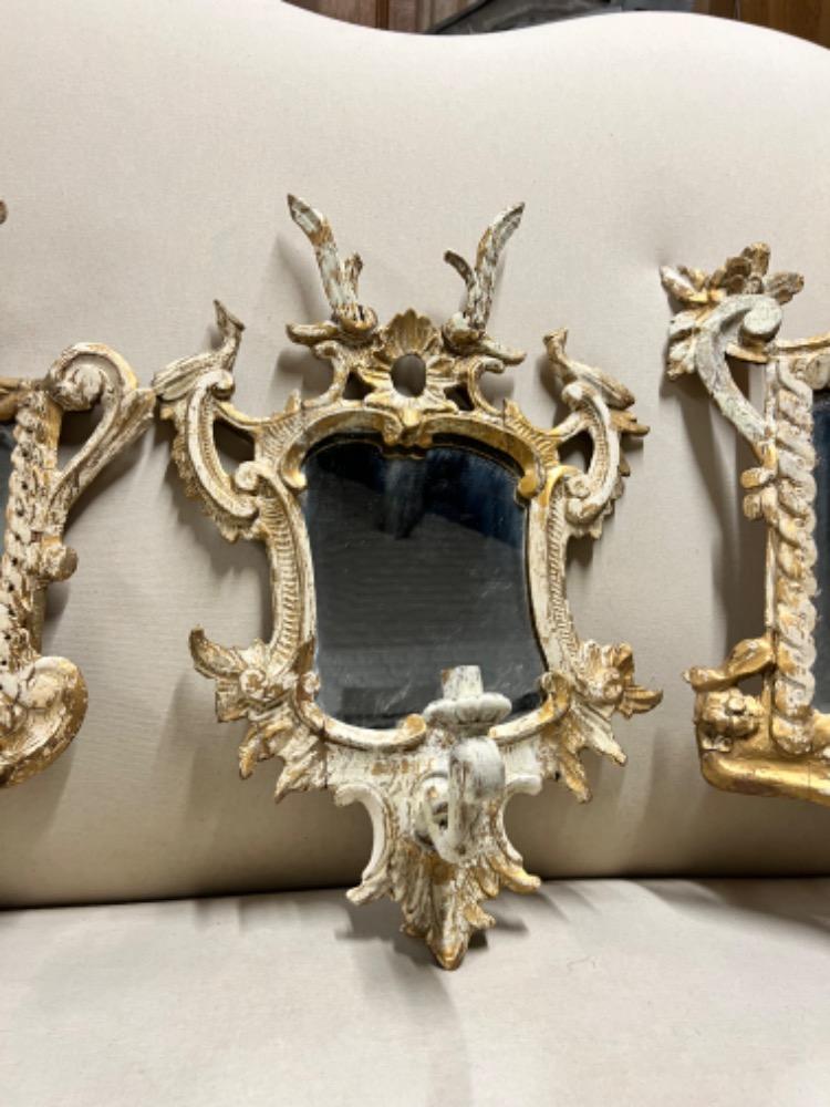 Suite of mirror sconces, early 20th century